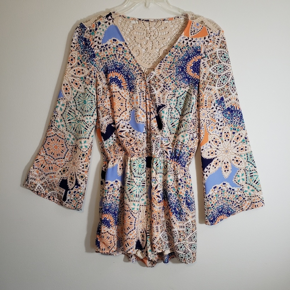 DR2 Romper With Lace Upper Back And Bell Sleeve